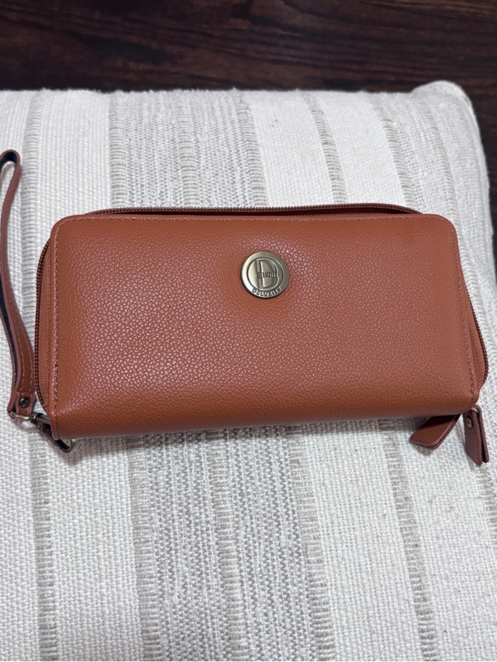 Pebbled Leather Wristlet Clutch in Cognac with Turn-Lock Emblem